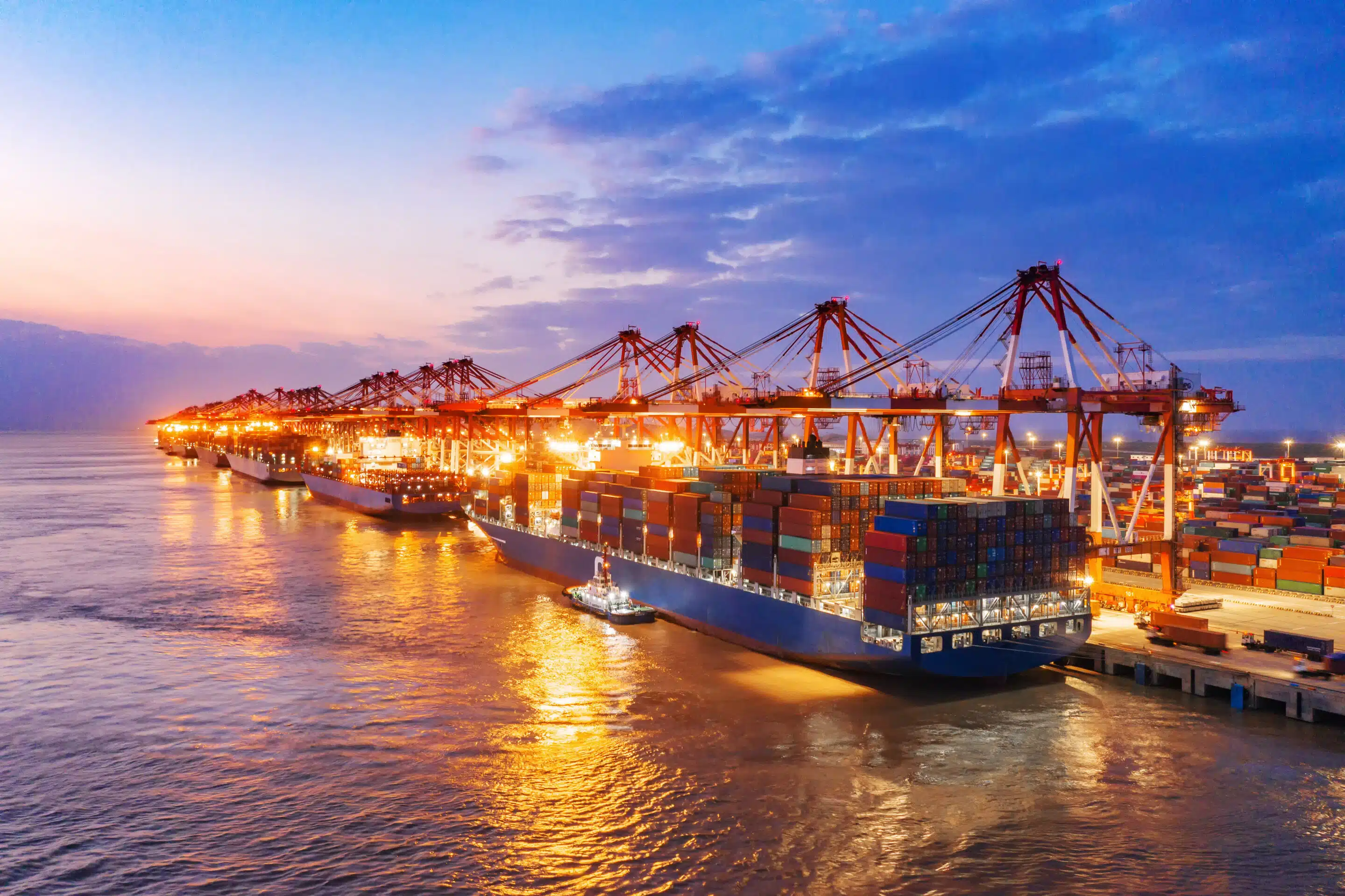 Freight being loaded on cargo ships at dock - Services offered - Shipping tips for smooth experience