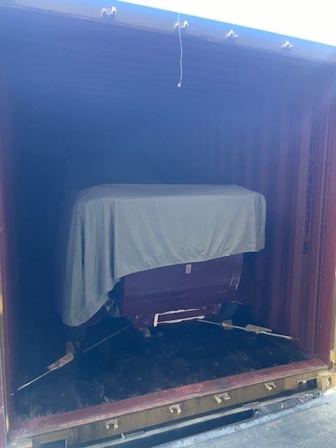 car container Rolls Royce loaded into shipping container - car in container